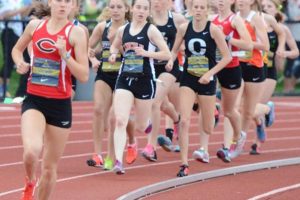 Alexa Efraimson breaks away from the pack during the Jesuit Twilight Elite 1,500-meter race Friday. The Camas High School junior crossed the finish line first with a time of 4 minutes, 21.1 seconds. Alexis Fuller earned second for Union and Alissa Pudlitzke placed third for Camas.