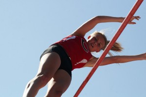 Caleigh Lofstead lets go of her pole vault after she clears the bar. Lofstead and the Camas girls track and field team became district champions Thursday, at McKenzie Stadium.