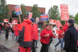 Employees from the Camas and Washougal school districts joined forces to raise awareness during a teacher walkout day on Wednesday, May 13.