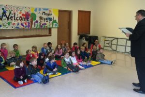 Camas Mayor Scott Higgins reads aloud a proclamation designating May 5 as "Camas-Washougal Parent Co-op Preschool Day." The program is celebrating its 75th year and is Clark County's oldest continually operating preschool.