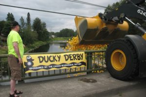 The Camas-Washougal Rotary Club participates in the "Ducky Derby," an annual fundraiser for the club's various service projects and scholarships. Plastic ducks are tossed off the Third Avenue Bridge in Camas. The grand prize winner receives a trip to Hawaii.