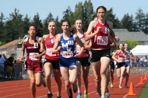 Camas runners Austen Reiter (left) and Camille Parsons (right) feed off each other in the 3A girls 1,600-meter state championship race Saturday, at Mt. Tahoma High School.