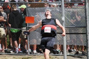 Josh Bischoff sends the discus into orbit Saturday, at Mt. Tahoma High School, in Tacoma. The Washougal High School junior earned second place at his first state meet with a personal best throw of 152-8.