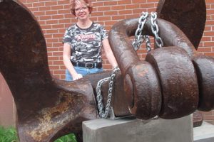 Liberty Middle School Princpal Marilyn Boerke was instrumental in efforts to obtain an anchor from an old World War II ship to be displayed in front of the school. The relic is a reminder of the school's name and its ties to local history.