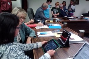 A fifth-grader in the iPad pilot program shows Washougal School District Superintendent Dawn Tarzian some of what she learned using her tablet this past year. The district has decided to expand the pilot to include all fifth-and sixth-graders next year.