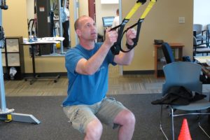 After having spinal fusion surgery, Doug Murray, a City of Vancouver firefighter from Camas, builds strength and flexibility in his back at Washougal Sport & Spine.