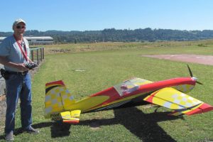 Brian Joiner prepares to fly his Pilot Extra 330 model plane on a sunny Friday morning. The Vancouver resident is the past president and current vice president of the Fern Prairie Modelers in Washougal.