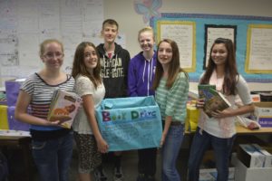 Canyon Creek Middle School National Junior Honor Society members Emma Hein, Natalie Garner, Scott Anderson, Bridgette McCarthy, Sydney Mederos and Phoebe Walker gave to their community and helped share their own passion for reading through a book drive to help underprivileged and at risk youth.