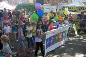 Vancouver Elite Gymnastics Academy members walk in the 2014 Camas Days Kids Parade. The popular annual festival typically draws between 10,000 to 15,000 people to the streets of downtown during the last weekend in July.