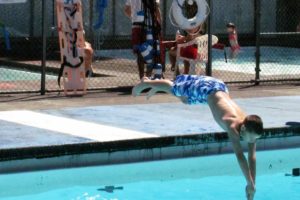 A patron plunges into the deep end of the Camas Municipal Pool last week as the temperature soared.