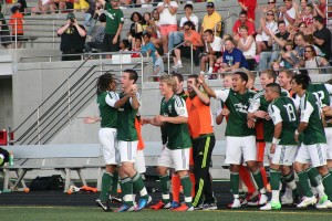 Nicholas Hamer (far left) joins in the celebration after providing the asisst on the decisive goal scored by Mark Sherrod. The Portland Timbers U-23 team defeated Washington Crossfire 1-0 Friday, in front of an estimated crowd of 2,056 fans at Doc Harris Stadium in Camas.