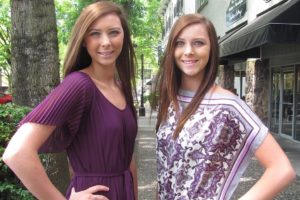 Identical twins Brandi (left) and Brittni Nester have kept busy modeling handbags and designer clothing this summer. They plan on attending Green River Community College in the fall and focusing on early education.