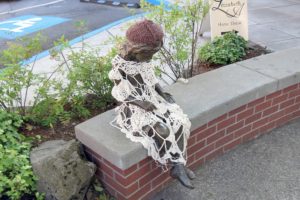 The festival volunteers got creative in their scavenger hunt, "yarn bombing" all over downtown, including the bronze statue located at the fountain at Northeast Fourth Avenue and Cedar Street.