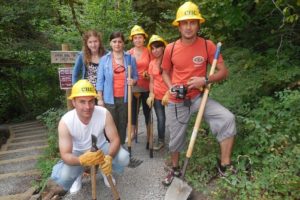 Visitors from the sovereign state of Georgia, located at the crossroads of Western Asia and Eastern Europe, spent time doing volunteer work at the Cape Horn Trail.