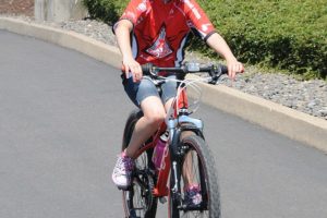 Contributed photo
Paige Maas, 9, is all smiles after completing the 26-mile course in the recent Tour de Cure event in Hillsboro, Ore. Her team, Paige's Pilots, raised more than $14,000 to help find a cure for diabetes.