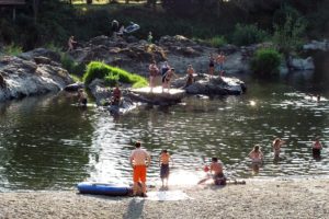 Floating, tanning and jumping off rocks into the water were all popular activities at the Sandy Swimming Hole last week.