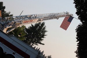 Camas Fire Department engines blocked off Northeast Fourth Avenue, between Everett and Franklin streets on Sunday morning, as a remembrance event in commemoration of the Sept. 11, 2001, terrorist attacks was held.