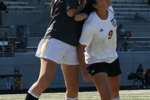 Sarah Yang gets her head on the soocer ball for the Papermakers Saturday, at Doc Harris Stadium. Camas defeated Enumclaw 6-0.