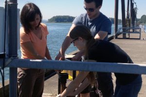 Contributed photo
Camas High School student Rachel Fadlovich (far right) tests a water sample at the Port of Camas-Washougal during her internship with the Center for Coastal Margin Observation and Prediction.