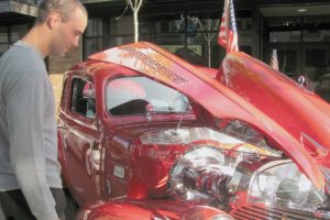 Garrett Erickson of Camas checks out one of the many vehicles on display at the Braggers Rights Classic Car Show, sponsored by Georgia Pacific.  Proceeds benefit local charities.