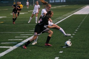 Heather Deulen goes toe-to-toe with a Lumberjill Sept. 16, at Fishback Stadium. The Washougal senior scored five goals in three victories for the Panthers last week.