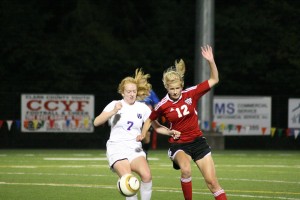 Camas junior Riley Allison (right) and a Columbia River Chieftain battle for the soccer ball Thursday, at Kiggins Bowl. The two teams fought to a 0-0 draw.