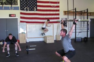 Individuals participate in a variety of weight lifting, gymnastics and cardio activities at CrossFit North Pacific, in Washougal. The business, owned by David and Polly Albright, opened in June.