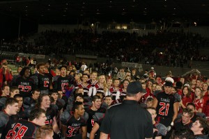 In a post-game huddle, the Camas Papermakers celebrate their 42-17 win against Skyview Friday night. It was the Papermakers' first league game following its move to the GSHL's Class 4A -- the largest classification in the state. Read the Tuesday, Oct. 2 print edition of the Post-Record for additional photos, game stats and interviews.