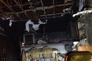 Approximately $75,000 to $100,000 in damage was caused by a fire that started on the back deck of a home where cigarette butts were kept in a plastic container. The residents were alerted to the blaze by the sound of the crackling fire and were able to exit the home before it spread to the interior of the house. No injuries were reported.