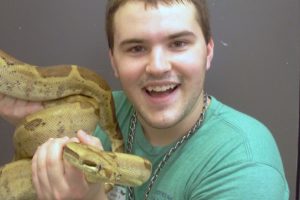 Matt Jackim, a 2011 Camas High School graduate, holds "Belize," a common boa constrictor, at the Oregon Zoo. "She is a very strong snake," Jackim said. "She is amazing -- the pattern of her scales. She is a personal favorite of mine." Jackim recently completed his fifth summer as a "ZooTeens" volunteer. His responsibilities included providing presentations to the public.