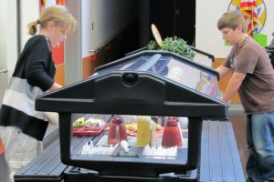 Students make selections from the vegetable and fruit bar at Helen Baller Elementary School.  The Camas School District won a national award for its nutrition program.