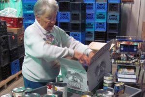 Faye Schanilec, a volunteer, sorts donations at the Inter-Faith Treasure House food bank. The Treasure House provides 45,000 to 65,000 pounds of food a month for area families. That includes monthly food boxes, USDA commodities, a backpack home program for children on weekends and meals served at the Lost & Found Cafe. Public and private donations have decreased, and the Treasure House no longer receives goods from the Oregon Food Bank. iWe need food,i said Treasure House Executive Director Nancy Wilson. "Our shelves are very empty now."