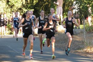 Papermaker runners Alexa Efraimson, Camille Parsons, Maddie Woodson and Alissa Pudlitzke get the upper hand on Skyview Oct. 2, on the Heritage Trail at Lacamas Lake. Eight Camas runners crossed the finish line before the first one from Skyview.