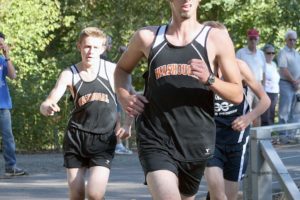 Washougal runners Noah Collins (front) and Geer McGee (left) finished in the top four with Sean Eustis and Isaac Stinchfield Thursday, at Lake Sacajawea Park.