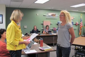 Dawn Tarzian, Washougal School Board superintendent, administers the oath of office to new School Board member Teresa Lees on Tuesday evening. Lees will represent district one, which has been vacant since last spring.