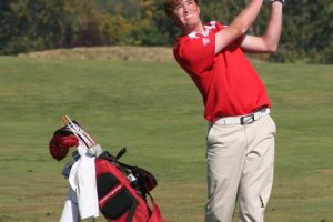 Camas freshman Brian Humphreys watches his chip shot take flight during the final round of the 4A district golf tournament Oct. 9, at the Tri-Mountain golf course. Humphreys finished in second place to lead the Papermakers to second place as a team.