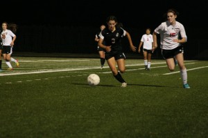 Savanna Joyce sets her sights on the soccer ball for the Papermakers. Camas and Union battled to a draw Oct. 9, at Doc Harris Stadium.