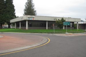 Jerry and Mary Sauer, owners of Excavator Rental Services, have purchased the Tidland Corporate Center, at 2305 S.E. Eighth Ave., Camas. The $3.3 million purchase from Camas Holdings, LLC, includes 64,000 square feet of industrial buildings and a 6.03-acre campus. Tidland employees will continue to work at the site, while ERS workers will relocate there. This photo was taken Friday afternoon, before a Garrett Sign Co. employee removed the Maxcess corporate signs.