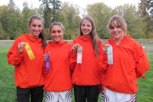 Danielle Frosrt/Post-Record
Karina Miller, Paige Roberts, Meredith Collins and Hannah Wright (left to right) show off their top 10 ribbons. These four girls helped the Panthers win the league championship race Thursday.