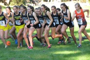 The Camas High School girls cross country team clinched their third district championship in a row Wednesday, at Lewisville Park in Battle Ground.