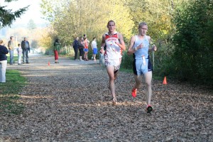 Washougal's Thomas Normandeau and Aaron Brumbaugh of Mark Morris battle for the lead in the 2A league championship boys cross country race Thursday, at Hockinson Meadows. Brumbaugh won in 16:22 followed by Normandeau in 16:44.