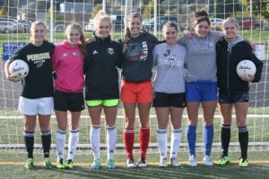 Marie Matthews, Perri Belzer, Mason Minder, Sarah Tennyson, Maddy Belzer, Alyssa Tomasini and Lauren Rood (left to right) have kept soccer balls out of the net for Camas. The Papermakers allowed only two goals in 16 games going into tonight's district championship match against Skyview.