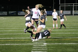 Riley Allison bursts through three Union Titans Saturday, at Doc Harris Stadium. The Papermaker girls soccer team beat Union in two games by the score of 1-0 to become the league and district champions.