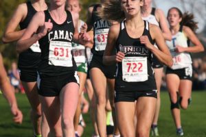 Camas runners Alissa Pudlitzke, Emma Jenkins and Emily Wilson push to the front of the pack with Alexis Fuller, of Union, in the 4A girls state championship race Saturday, in Pasco. Fuller took third place, followed by Jenkins and Pudlitzke.