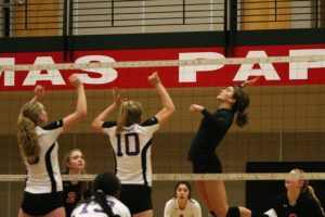 Camas senior Taylor Jones drops the hammer on Heritage during the district semifinals Thursday, in Camas. The Papermakers defeated Heritage and Battle Ground for the championship.