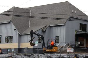 Crews work to finish up renovations on the American Legion Hall at 1554 N.E. Third Ave. On Tuesday, Nov. 20, its new occupants, CID Bio-Science, will welcome the public during an open house from 10 a.m. to 4 p.m.