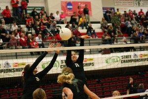 Lauren Harris and Carly Banks attack the volleyball for Camas during the state tournament Friday, at St. Martin's University. See the photo gallery at www.camaspostrecord.com.