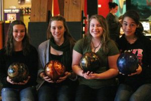 Camas High School varsity bowlers Courtney Warta, Isabella Gilbertson, Shelby Chartrand and Ariel Laycock lead 19 other Papermakers on the lanes.