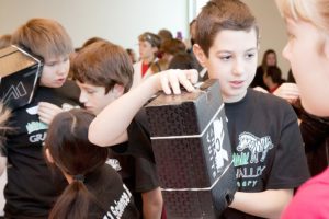 Students from Grass Valley Elementary School in Camas took part in the Nov. 19 Elementary Science Olympiad Invitational Tournament at Clark College. Pictured above are Grass Valley students (left to right) Luke Brewer, Zach Macia and Danilo Kamenko. The Camas school's "Team 1" (groups A and B) earned Top Group awards in two events.