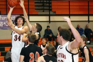 Aaron Diester (34) and Isaac Bischoff (50) give Washougal speed, strength and agility under the basket. The Panthers host La Center in the first game tonight. Junior varsity tips off at 5:30 p.m., followed by varsity at 7 p.m.